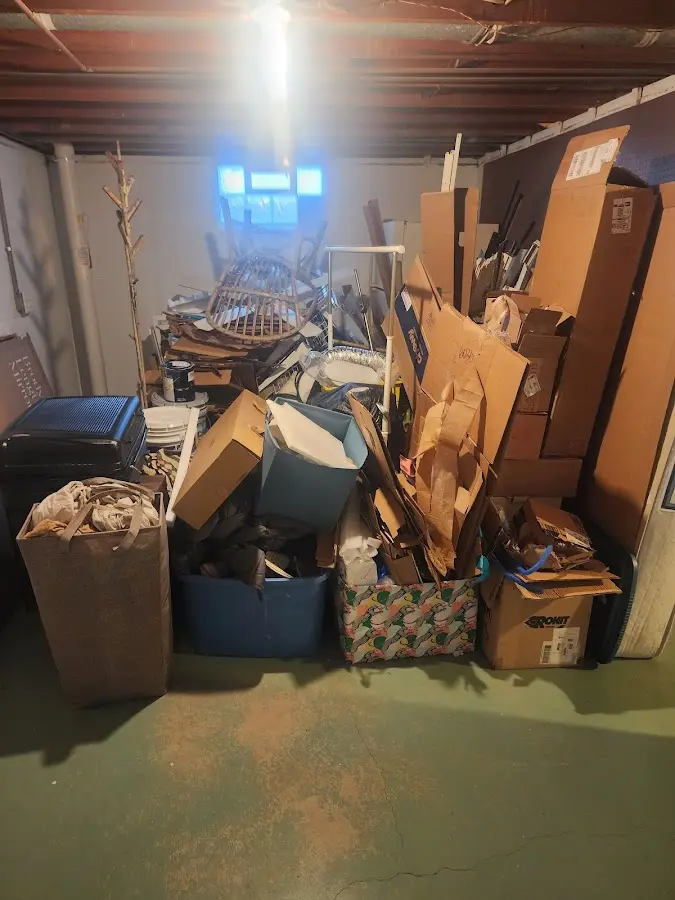 Roll-off dumpster container at job site for Construction Dumpster Rental in Brookline